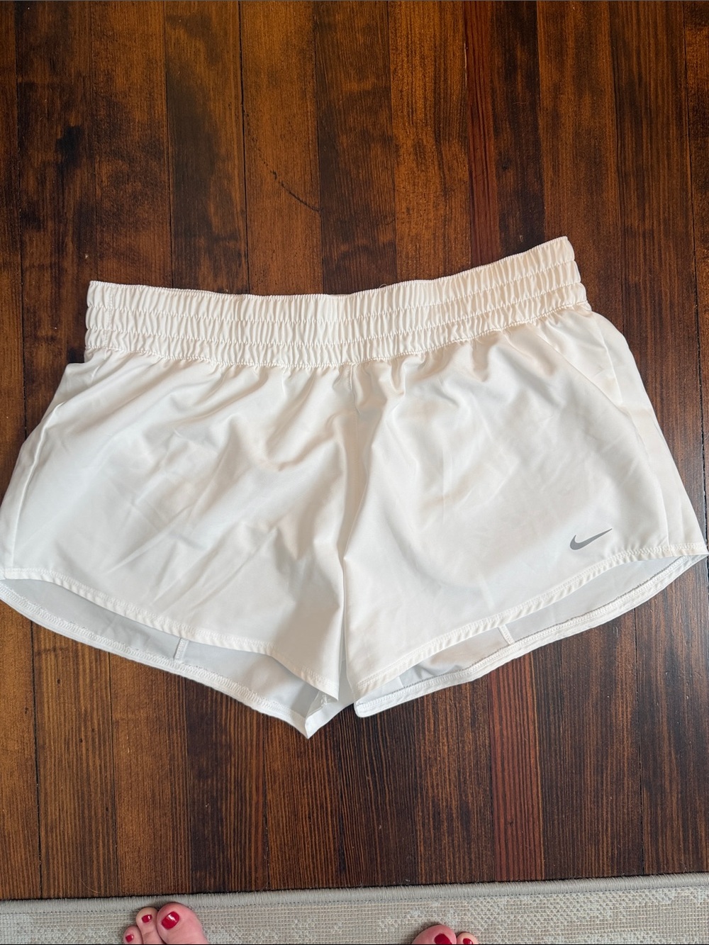 Nike White Women's Athletic Shorts with Silver Swoosh